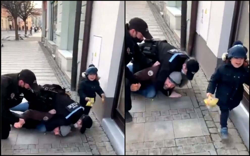 Polis maska taxmayan atanı övladının gözü qarşısında həbs etdi - VİDEO