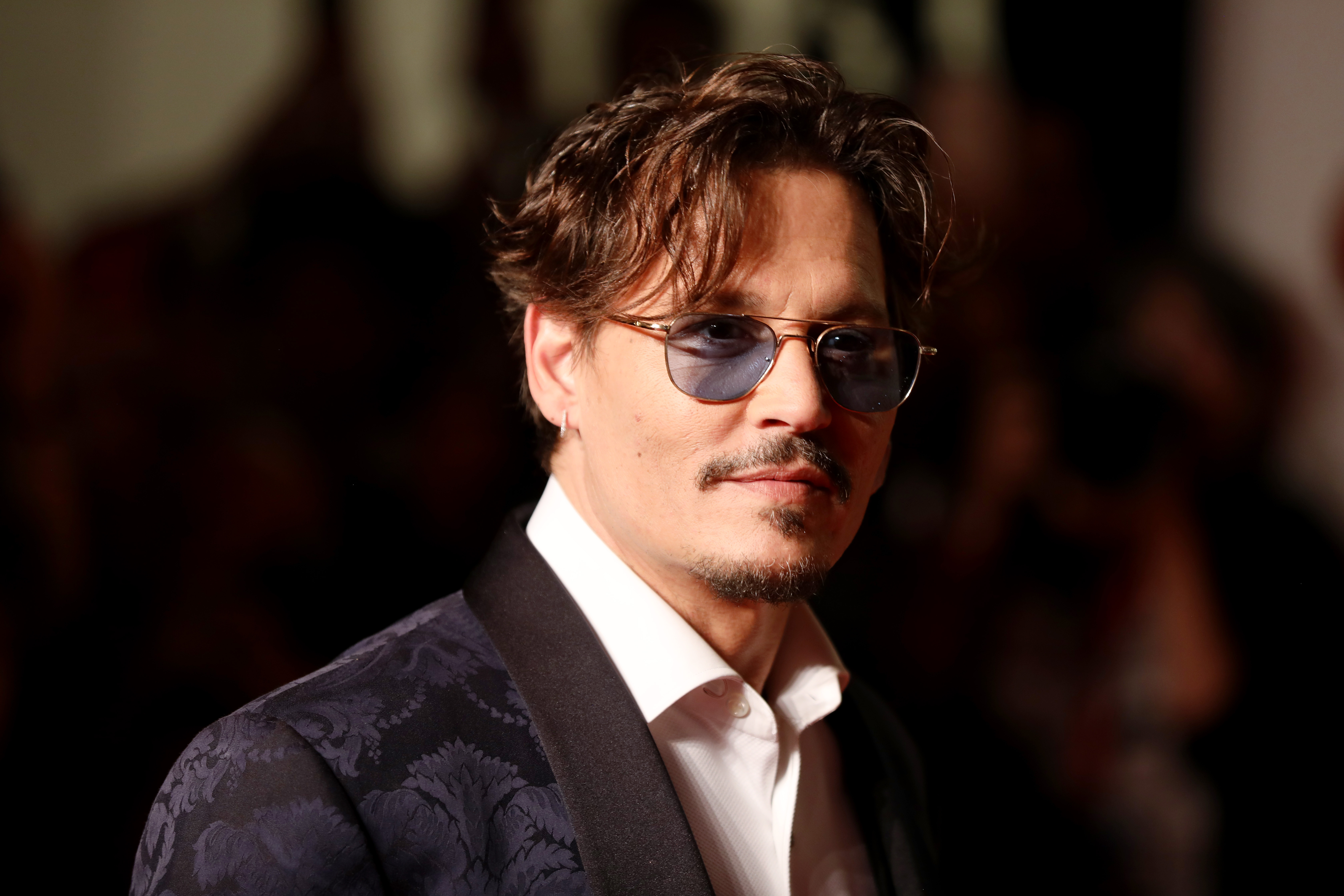 Conni Depp keçmiş həyat yoldaşına təzminat davası açdı - Saxtakarlıq iddiası