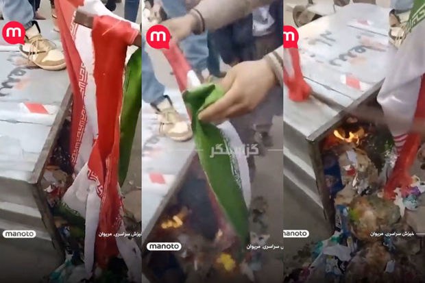 İranda etirazçılar ölkə bayrağını zibil qutusuna atıb YANDIRDILAR - VİDEO 