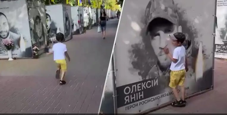 Müharibədə ölən atasının pankartını görən ukraynalı uşağın DUYĞUSAL ANLARI - FOTO/VİDEO