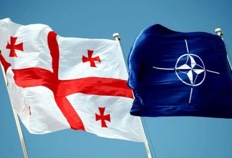 Britaniya NATO-ya girmək istəyən Gürcüstanın gözünü Rusiya ilə qorxudur