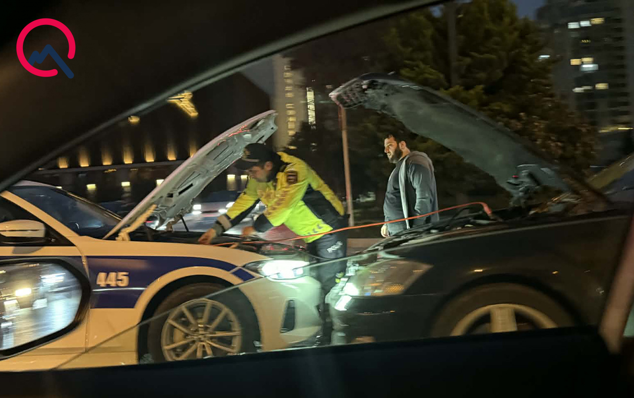 Polis yolda qalan sürücüyə belə kömək etdi - FOTO