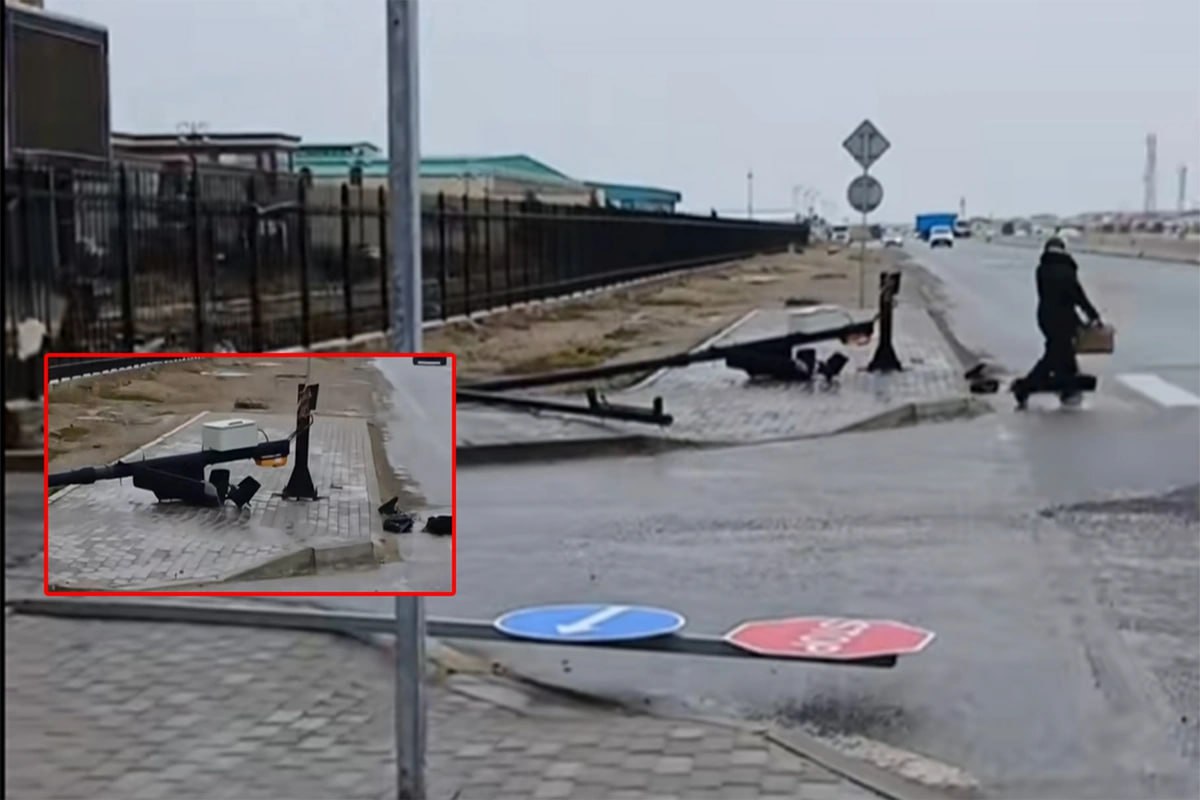 Güclü külək Lökbatanda yol nişanlarını aşırdı - VİDEO