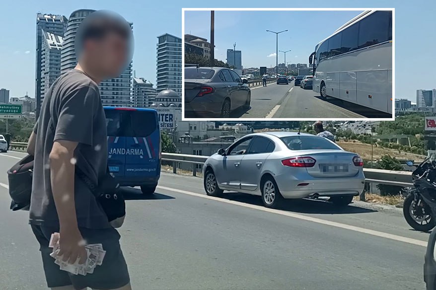 Kuryer motosikletdən yıxıldı, yola səpələnmiş pulları sürücülər yığdı &ndash; VİDEO