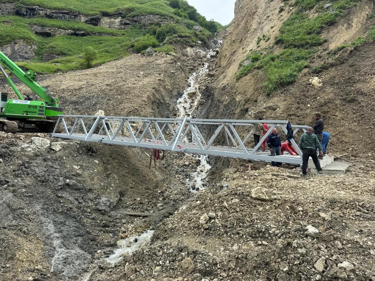 Qusarda selin dağıtdığı yollar bərpa olundu - İcra başçısı yeni körpünü istifadəyə verdi - FOTO