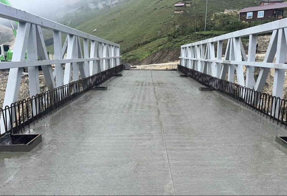 Qusarda sel sularının zədələdiyi yol və körpülər bərpa edildi