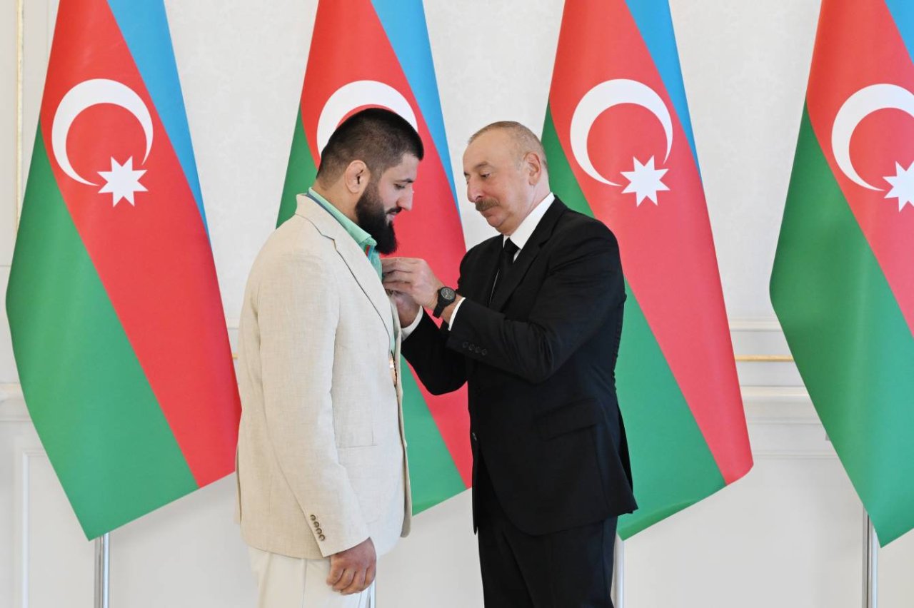 İlham Əliyevin idmançılarla görüşündən FOTOLAR - foto 18