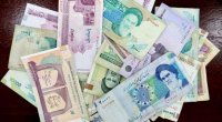 İranda əhali valyuta almaq üçün banklara axışdı - VİDEO 
