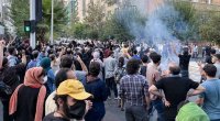 İranlı idmançı mükafatlandırma mərasimində hicabını çıxardı - VİDEO