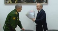 Putin əlində gül buketi tutaraq Şoyqu ilə zarafat etdi – VİDEO  