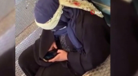 Dilənçi qadının "iPhone" markalı telefonu GÜNDƏM oldu - VİDEO