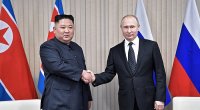Putin Kim Çen İni təltif etdi