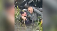 Polis suya düşən sürücünü belə xilas etdi – VİDEO