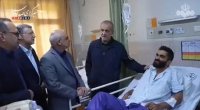 İran Prezidenti yaralılara baş çəkdi - VİDEO