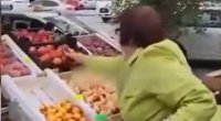 Yekaterinburqda ruslar həbs olunan miqrantların satdıqları meyvə-tərəvəzi taladılar – VİDEO