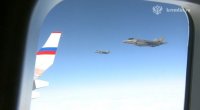 F-22 qırıcıları Putinin təyyarəsini müşayiət etdi – VİDEO