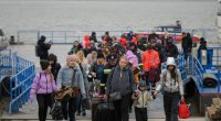 Polşa işləməyən ukraynalı miqrantların sosial ödənişlərini LƏĞV EDİR