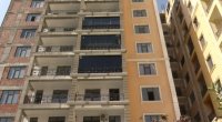 Binanın 11-ci mərtəbəsindən ev aldı, tikinti həmin qata çatanda işlər dayandı - VİDEO
