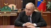 Putinlə görüşə gedən rəsmilər saatlarını təhvil verir &ndash; FOTO