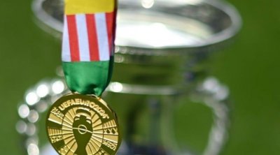 UEFA qızıl medalları və kuboku nümayiş etdirdi - FOTO