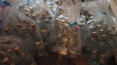 Topdansatış mağazasında 200-dən çox saxta alkoqollu içki aşkarlandı – FOTO