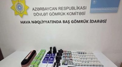 Telefonun içərisində gömrükdən qızıl külçələr keçirmək istədilər – FOTO