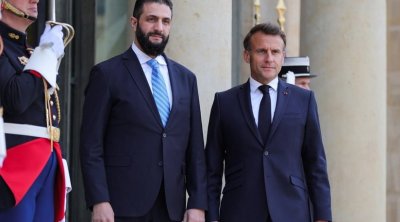 Makron suriyalı həmkarı ilə telefonla danışdı