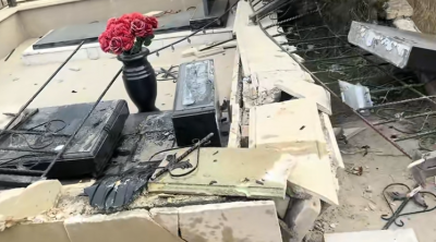 Bakıda 80 yaşlı qadın maşınla qəbirləri dağıtdı — VİDEO