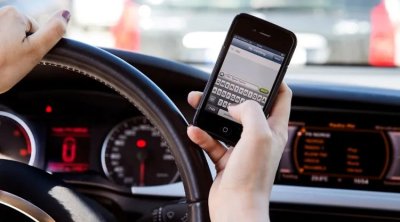 Sükan arxasında telefondan istifadə edən sürücüyə töhmət verildi - FOTO