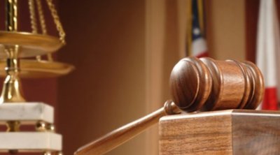 Ərini qətlə yetirən qadının məhkəməsi: "Oğlumu öldürdüyünü gizlədib"