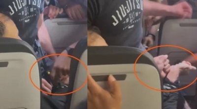 Təyyarənin qapısını açmaq istədi, marşrut dəyişdi - Havada dəhşətli anlar - Video