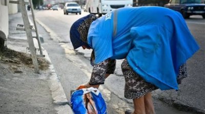 Əri süpürgəçi qadını 8 Martda ona verilən güllərə görə öldürübmüş...