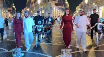 Hüseyn Həsənov robotla Bakının mərkəzində gəzdi &ndash; VİDEO
