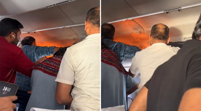 Poverbank alovlandı, təyyarə təcili eniş etdi - Video