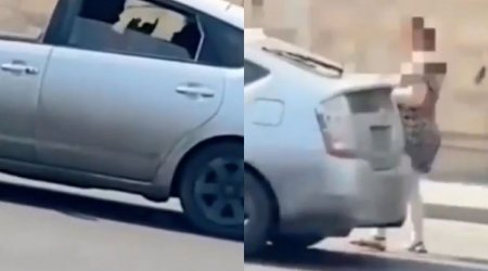 Paytaxtda OLAY: Taksi sürücüsü qadın sərnişini döydü - VİDEO
