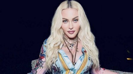 Madonna oteldə yarıçılpaq FOTOSESSİYASI ilə əndazəni aşdı