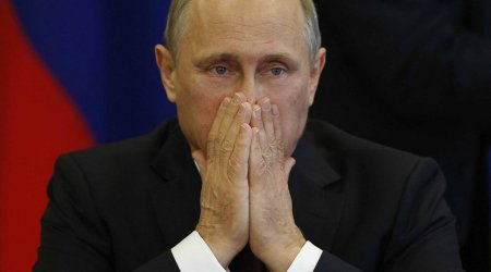 “İlk dəfə onda diz çökdüm” - Putin