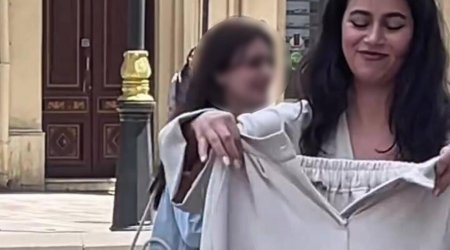 Bakıda qızı küçədə "soyundurub" reklam çəkdilər - VİDEO