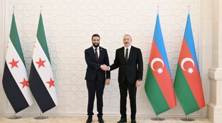 İlham Əliyevin Suriyanın keçid dövrü Prezidenti ilə geniş tərkibdə görüşü olub - FOTO