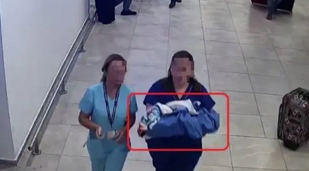 Körpəsini aeroportda unitaza atan qadın azadlığa buraxıldı – FOTO