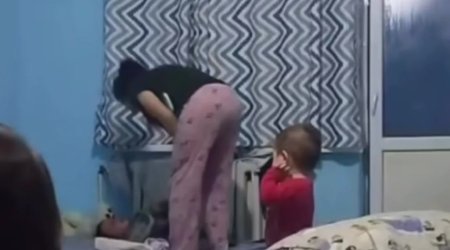 Qadın öz uşağını radiatora bağlayaraq vəhşicəsinə döydü &ndash; VİDEO
