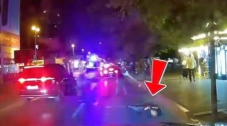 Bakıda maşının altına uzanan piyada saxlanıldı&ndash; VİDEO
