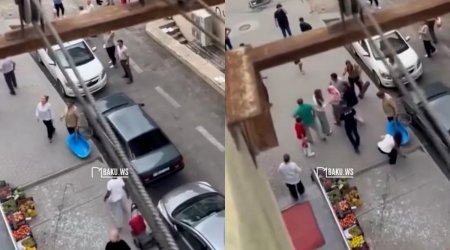 Binanın eyvanından şüşə qopdu, qadının başına düşdü &ndash; VİDEO