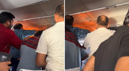 Poverbank alovlandı, təyyarə təcili eniş etdi - Video