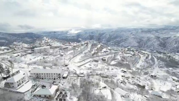 Laçın şəhəri də ağ örpəyə büründü - FOTO